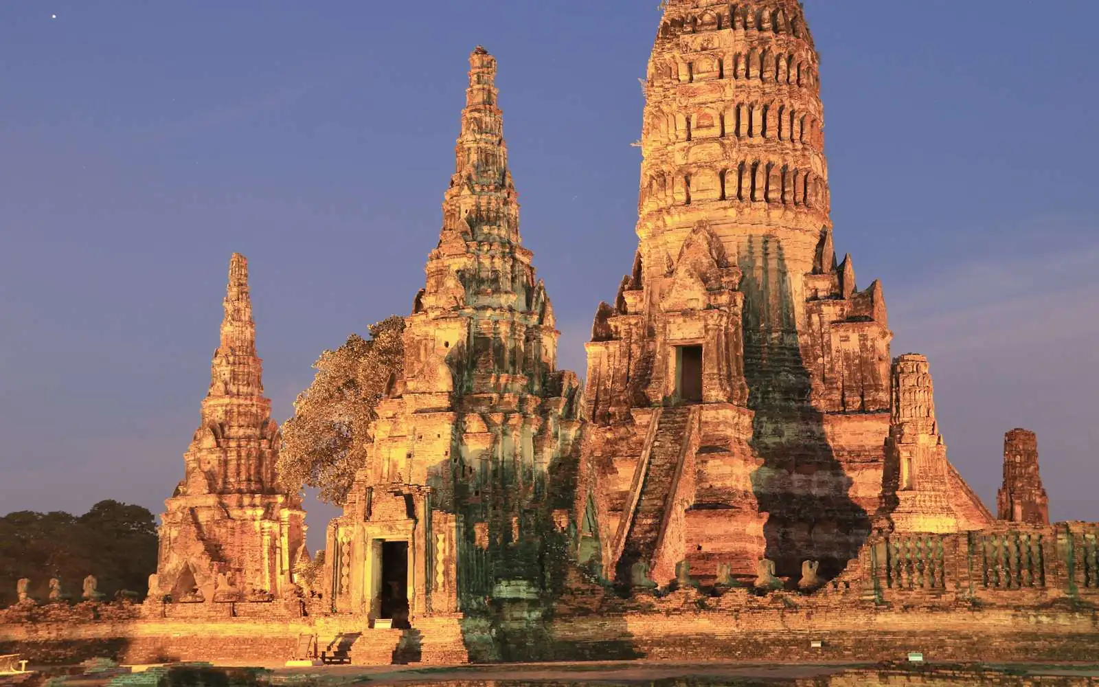 The prangs of Wat Chaiwatthanaram at Ayutthaya at dusk