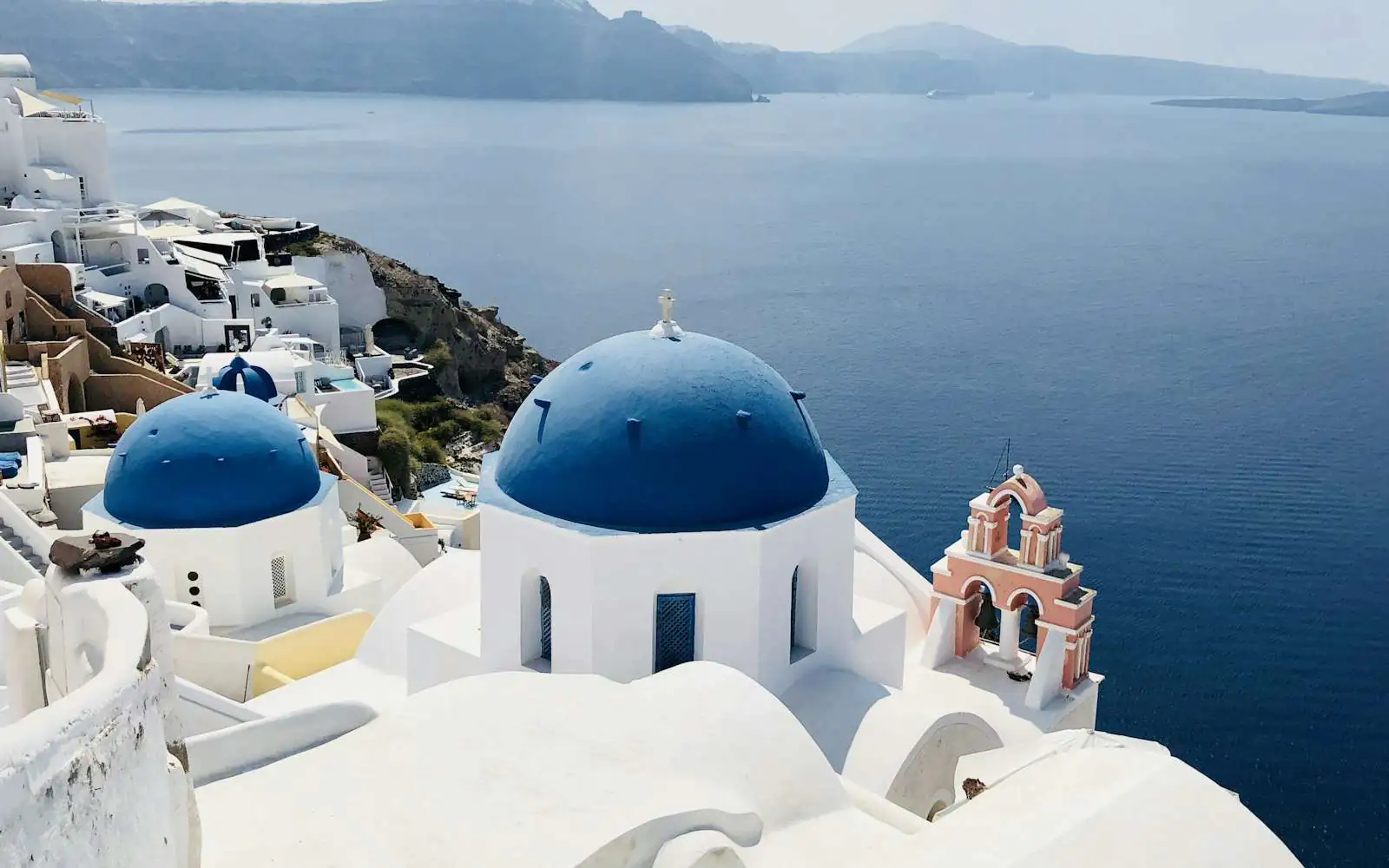 Blue domes of Oia over the Santorini caldera